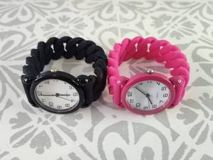 lot 2098 image: Twist Band Fashion Watches with Silicone Bands - Black and Pink Set