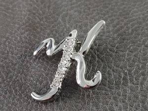 lot 2108 image: Crystal Letter K Silver-Toned Pin Brooch