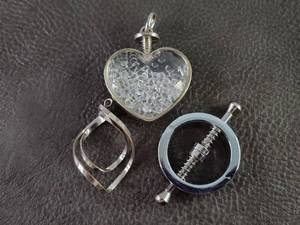 lot 2112 image: Crystal Heart Shaker Pendant Set