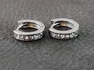lot 2125 image: Crystal Studded Silver-Toned Huggie Hoop Earrings