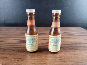 lot 2473 image: Budweiser Mini Glass Bottles Salt and Pepper Shakers