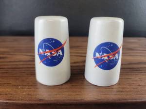 lot 2499 image: NASA Logo Salt and Pepper Shaker Set