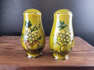 lot 2523 image: Yellow Ceramic Salt and Pepper Shakers with Grape Design