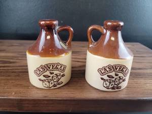 lot 2526 image: Las Vegas Themed Ceramic Miniature Jugs salt and Peppers Shakers