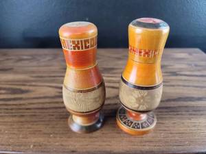 lot 2555 image: Mexico Mid-Century Orange Striped Salt and Pepper Shakers