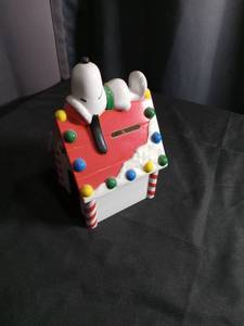 lot 2273 image: Snoopy and Whitmans Holiday Doghouse Bank