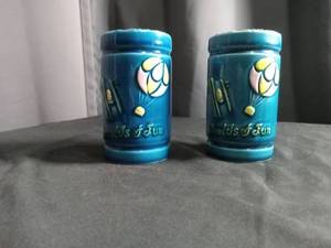 lot 2284 image: Worlds of Fun Blue Ceramic Salt and Pepper Shakers
