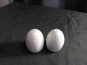 lot 2668 image: White Ceramic Salt and Pepper Shakers