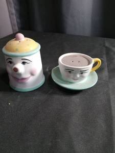 lot 2673 image: Decorative Face Tea Cup and Saucer salt and pepper shaker set