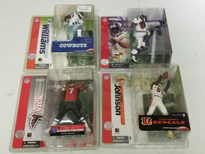 lot 1077 image: McFarlane NFL Action Figure Lot of 4 Different w Michael Vick & Culpepper Variant New