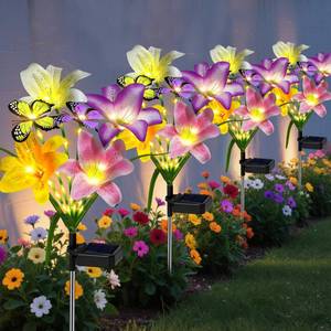 lot 5433 image: ostritec Solar Garden Lights Outdoor, 4 Pack Flower Lights for Outside, 16 Solar Lilies with Butterflies, Waterproof Garden Decor for Yard, Patio, Gifts for Women Mom (4 pcs Lilies)