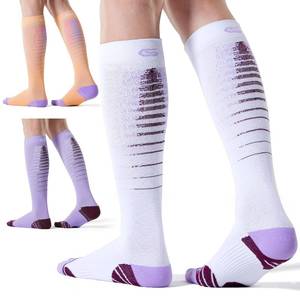 lot 6179 image: CS CELERSPORT 3 Pairs Compression Socks for Men and Women Running Support Socks, WhiteOrangePurple, SmallMedium