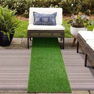 lot 15934 image: GLOBREEN 2X6 FT Artificial Turf Grass Runner Rug for Dogs, Thick Realistic Fake Grass for Patio, Balcony, Indoor Outdoor Puppy Potty Training Turf, with Drainage Hole