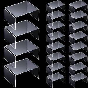 lot 16319 image: Taiyin 24 Pieces Acrylic Risers for Display Clear Acrylic Stand Shelf Display Risers for Collectibles Tabletop for Jewels Cupcakes Tea Sets Small Toys Arts Crafts and Candy (4 x 3 x 2 Inch)