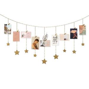 lot 18260 image: Mkono Hanging Photo Display Boho Decor Wooden Stars Garland with Metal Chains, Pictures Cards Holder with 25 Wood Clips, Wall Art for Christmas Living Room Bedroom Dorm Decor, Teen Girls Gift, Gold