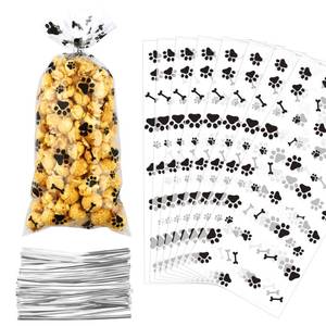 lot 20427 image: 100 Paw Print Dog Treat Bags - Heat Sealable Candy Bags with 100 Silver Twist Ties for Pet Birthday Party Favor Supplies, Black