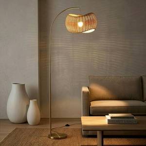 lot 231381 image: Retails for $160 Brightech Wave Arc Floor Lamp - Chic Standing Lamp with Unique Hanging Wicker Pendant Shade for Living Room, Boho Rattan Natural Decor Lamp, Arcs Over Sofa, Bedroom & Office Desk for Reading - Brass
