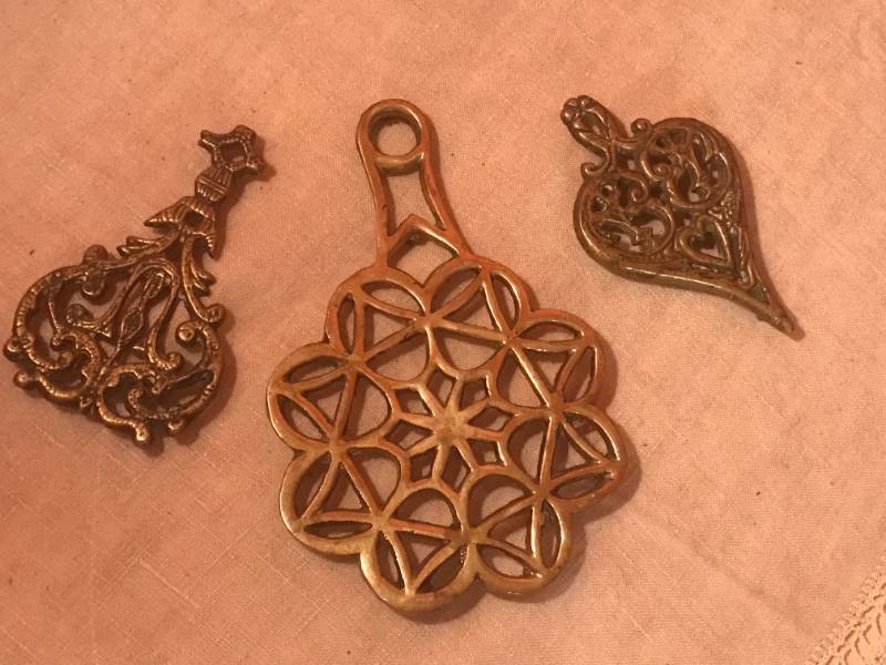 lot 2379 image: Set of Brass Trivets
