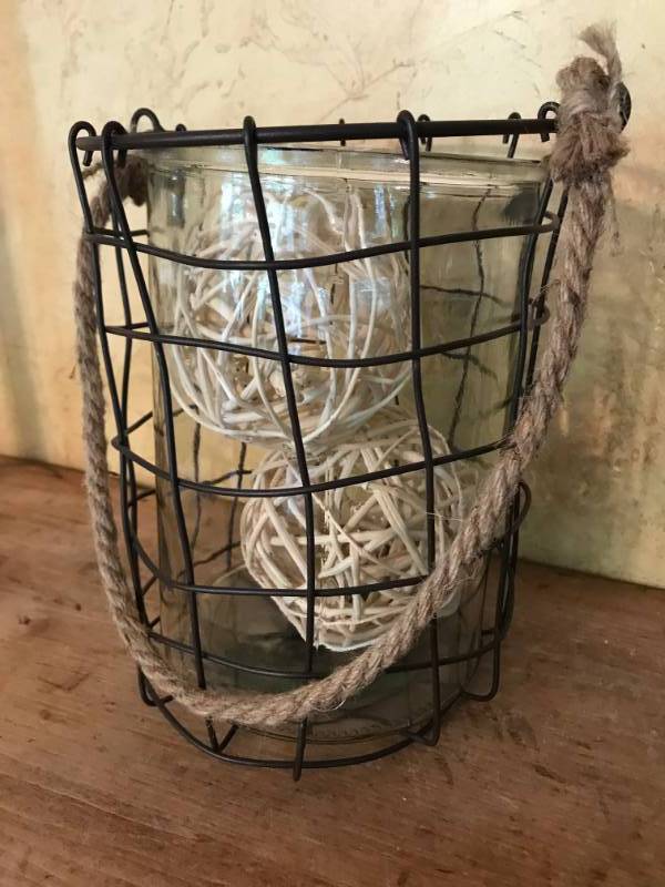 lot 2426 image: Metal hanging basket with glass vase