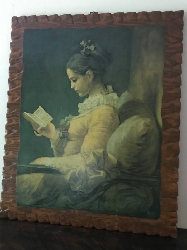 lot 2480 image: Antique Girl Reading mounted on plank of wood and edging carved