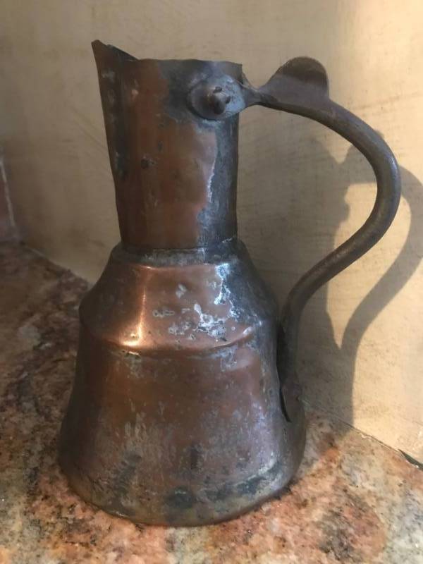 lot 2490 image: Rustic Brass Pitcher