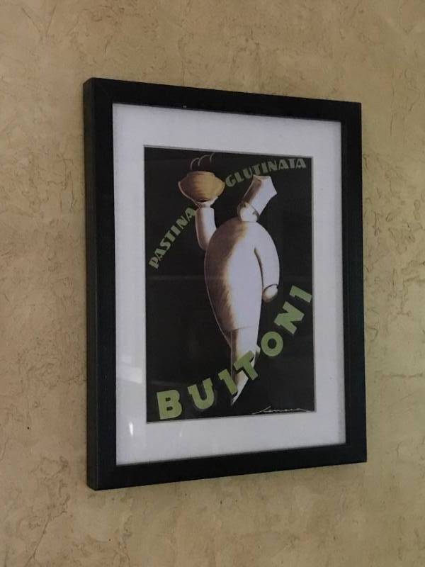 lot 2532 image: Framed Print of the Vintage Pastina Glutinata Buitoni Italian Food Figure