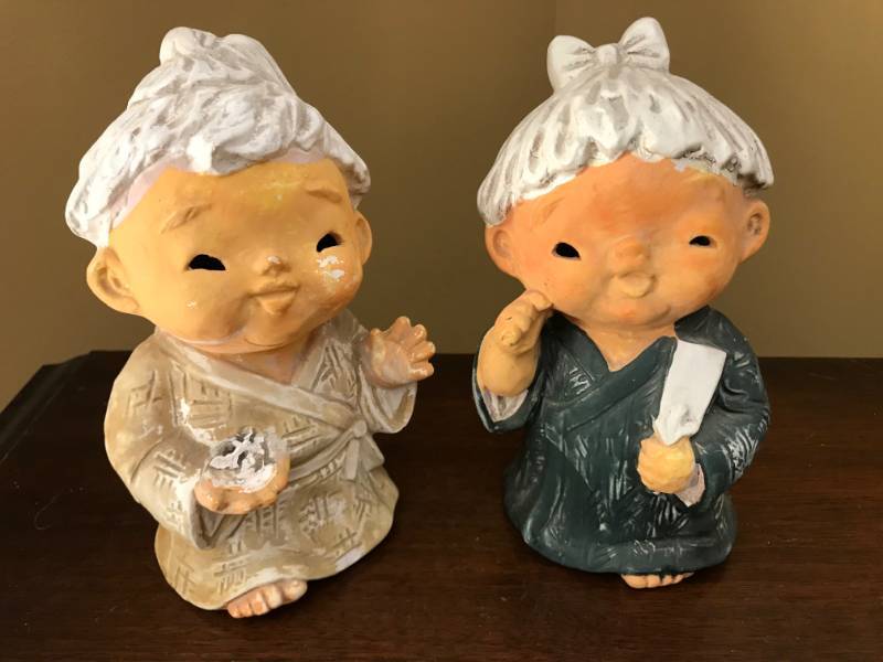 lot 2543 image: Vintage Ceramic Asian boy and girl figurines