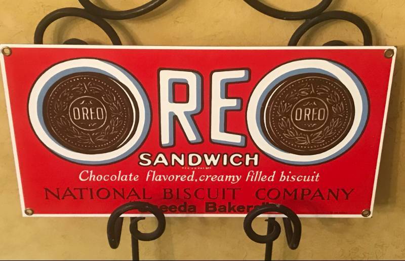 lot 2588 image: Thick Metal Oreo Cookie Sign--metal stand not included