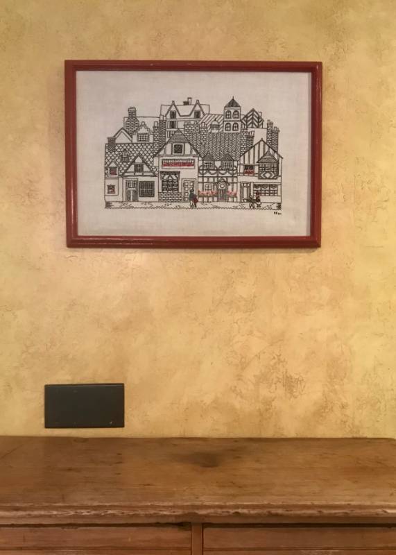 lot 2619 image: Rustic framed needle work of small town street