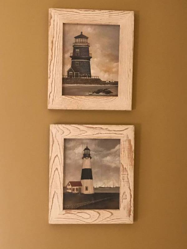 lot 2652 image: Set of two white washed framed lighthouses