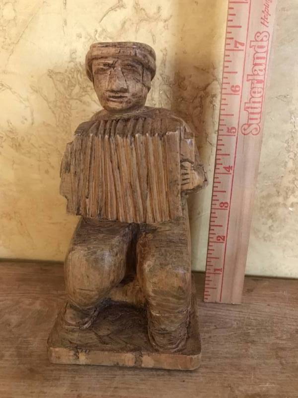 lot 2730 image: Hand Carved Wood Figure of Man with accordion