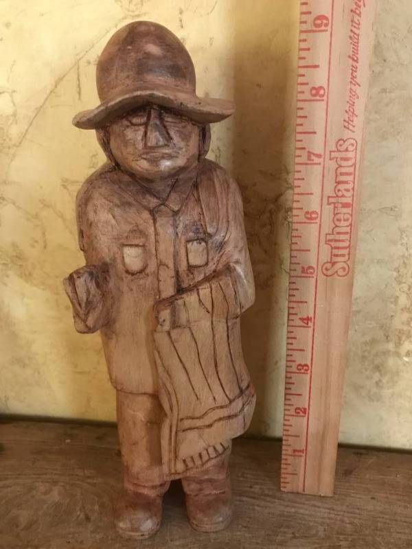 lot 2735 image: Hand Carved Wood Figure of Man with towel