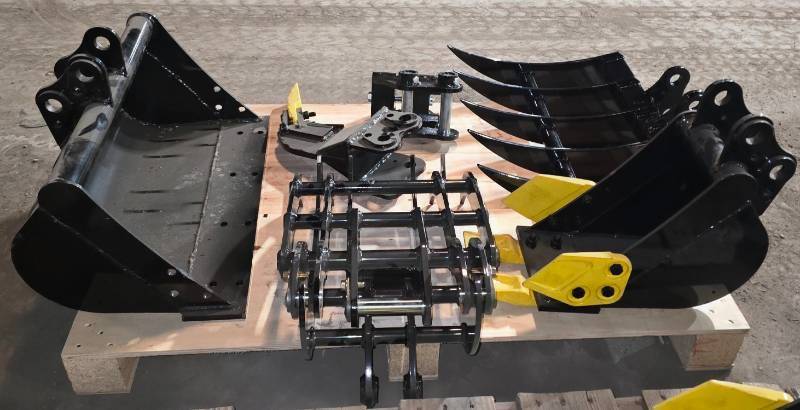 lot 6303 image: Unused Lot of Six (6) Mini Excavator Attachments - Fits 1-2 ton Mini Excavators - Rake - Quick Attach Coupler - Ripper - Tooth Bucket - Grapple - 24in Flat Bucket