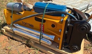 lot 5486 image: Unused Box Type TOFT 680 Hydraulic Hammer w 45mm Pins to fit CAT 305 and 5-8 ton Excavators