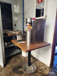 lot 3747 image: Assorted Lot W Stainless Steel Tea Dispenser, Mounted First-Aid Kit, Restaurant Table, and More
