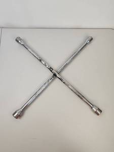 lot 84 image: Chrome Four-Way Lug Wrench