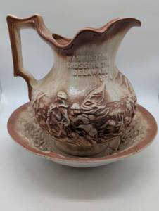 lot 99686 image: Washington Crossing the Delaware Commemorative Ceramic Pitcher and Bowl Set