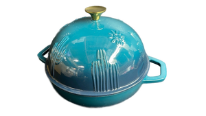 lot 15015 image: Le Creuset Cast Iron Enameled Dutch Oven in Caribbean Blue lid chipped slightly