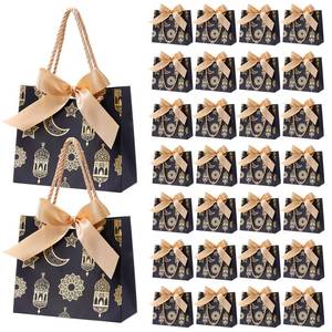 lot 19595 image: Marspark 30 Pcs Ramadan Mubarak Reusable Gift Bags with Bow, Black Gold Foil Stamping, Eid Lantern Treat Bags with Handles, Reusable Eid for Gifts Wrapping, Kareem Party Supplies, 14  6  12cm
