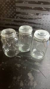 lot 11357 image: Glass Storage Jars with Clip Lids - Set of 3 (Used)