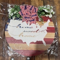 lot 5386013 image: Patriotic Eagle Wooden Wall Sign with Decorative Greenery - Retail $15
