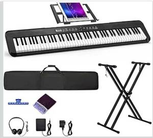 lot 4513 image: 88 Key Digital Piano, Semi Weighted Electronic Keyboard Piano with Music Stand, Power Supply, Sustain Pedal, Stand, Bluetooth, Carrying Case, Headphones, USB-MIDI, Piano Lessons for Beginners