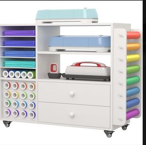 lot 16362 image: Craft Organization and Storage Cart Compatible with Cricut Machine Cricut Table, Rolling Craft Organizer with Two Large Drawer & 24 Vinyl Roll Holder & Paper Storage Organizer, for Home Craft Room - Retail $175