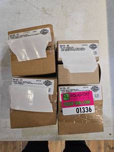 lot 1336 image: Harley-Davidson OEM Parts Lot - Chrome Foot Peg Bolts #94133-01 and Fender Hardware #94415-05