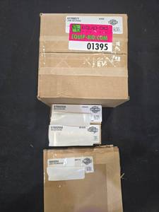 lot 1395 image: Harley-Davidson OEM Parts Lot - Lamp Holder and Red Reflectors