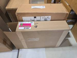 lot 1407 image: Harley-Davidson OEM Parts Lot - Instrument Cluster and Armrest