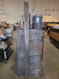 lot 11113 image: Uline Chrome Wire Shelving Unit - 4 Shelves &amp 4 Posts