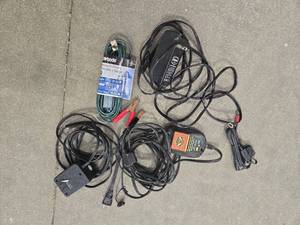 lot 9305 image: Harley-Davidson and BikeMaster Battery Charger - Set of 2