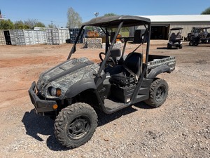lot 4423 image: Axis 500 4x4 Side by Side  Gas Powered, High Output Engine, 652 miles, No Winch Controller Included, but has extra parts as well as Windshield Kit.  Runs and Drives Great