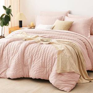 lot 2464 image: $60 CozyLux King Size Comforter Set, Blush Pink Seersucker, 7 Pieces